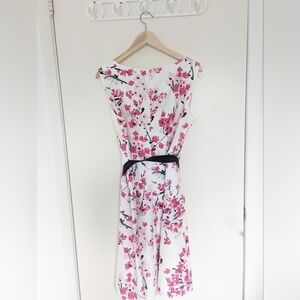 Semi-formal dress with flower patterns and black ribbon belt (size 16)